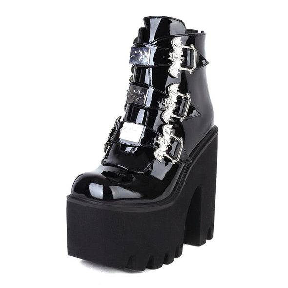 "Elvira" black platform ankle boots with bat accent buckles