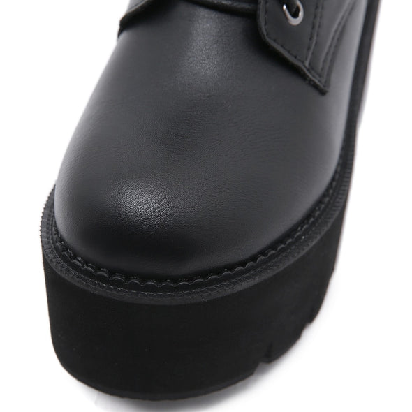 "Peyton" black platform ankle boots with  accent